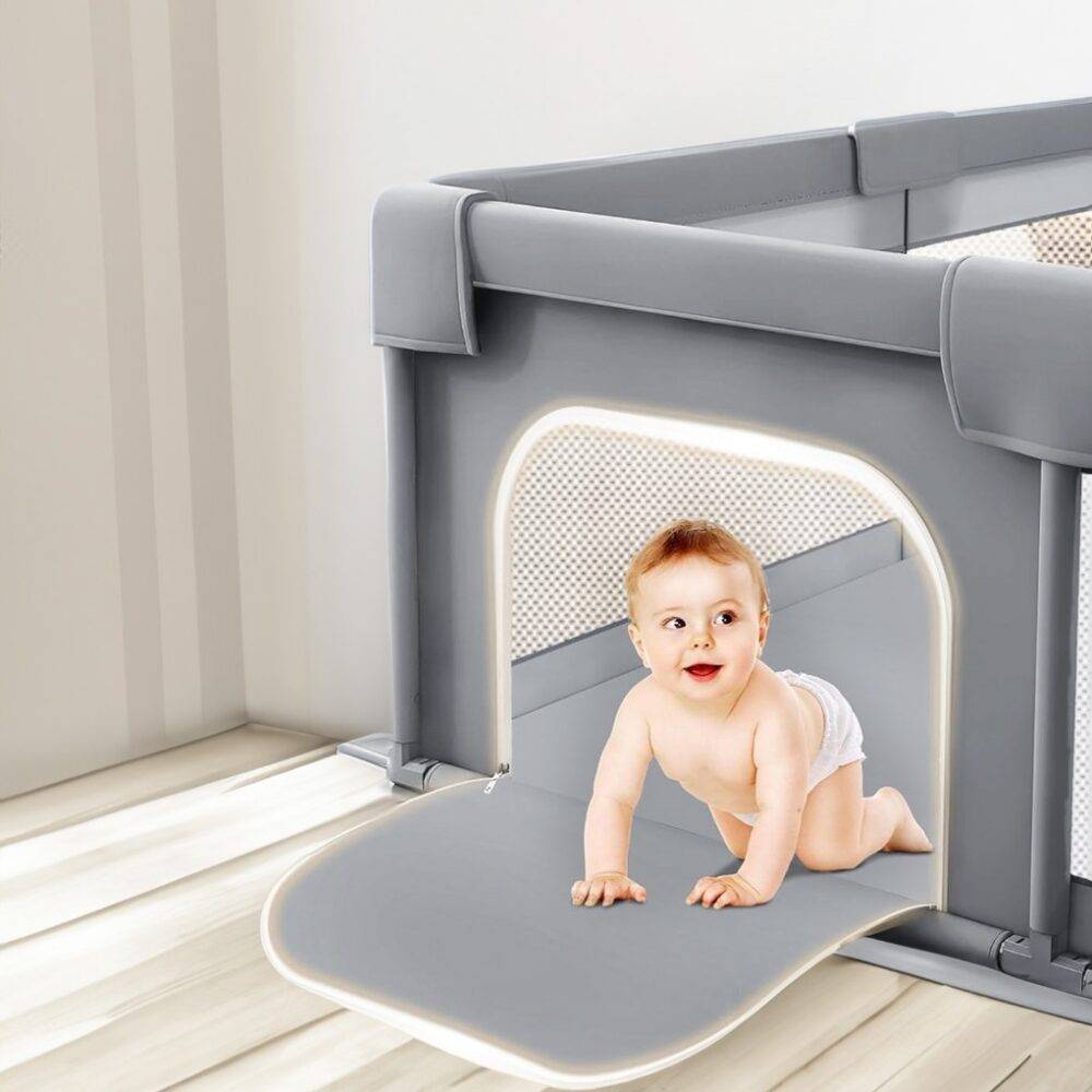 Portable baby playpen with 2 pull rings and carry bag, featuring a foam bumper fence and breathable mesh sides for a safe indoor and outdoor play area.